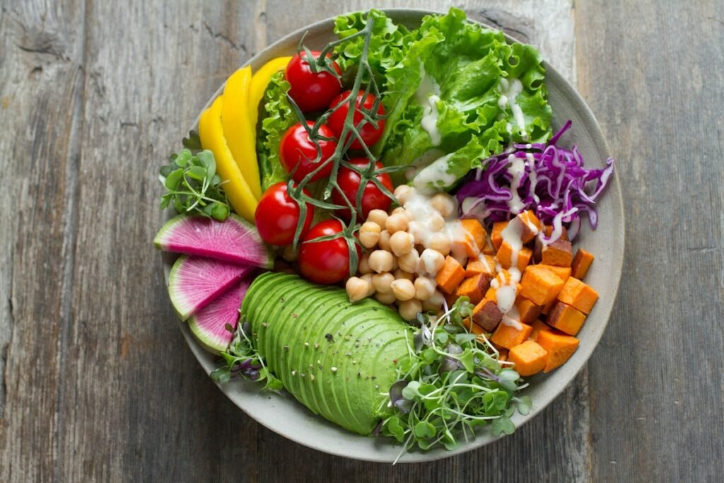 Colorful anti-inflammatory foods including berries, turmeric, and leafy greens