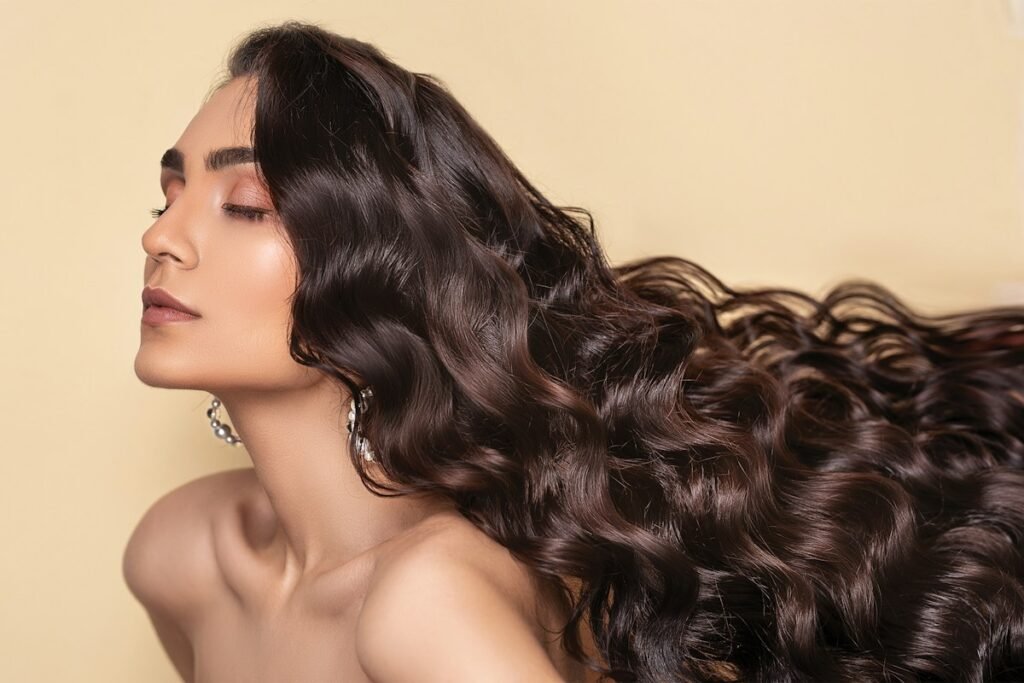 Woman with healthy hair showing nutritional foods for hair growth